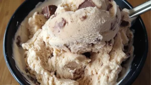 healthy peanut butter frozen yogurt in a yellow bowl